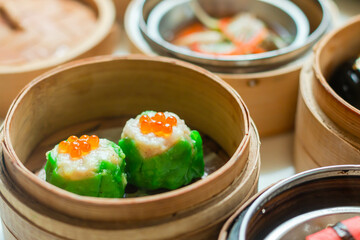 Dim sum in bamboo steamer, chinese cuisine