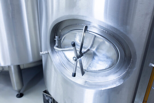 factory tank valve. beer manufacturing background technology