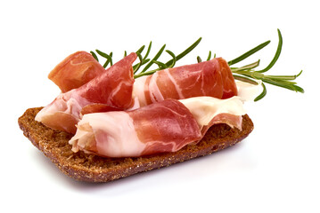 Traditional Spanish Jamon Serrano ham, Prosciutto Crudo, Parma ham, Italian antipasto, isolated on white background.