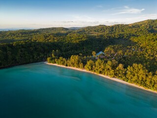 Aerial shot of the Ao Jak beach on Koh Kood island in Thailand surrounded by the blue sea © Nicola78/Wirestock Creators