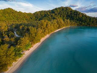 Aerial shot of the Ao Jak beach on Koh Kood island in Thailand surrounded by the blue sea © Nicola78/Wirestock Creators