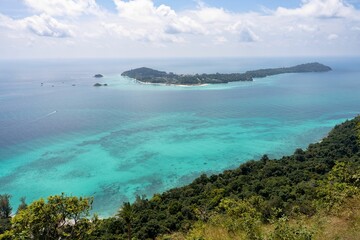 Aerial shot of the Ko Adang and Ko Lipe islands in the blue sea in Thailand on a sunny day