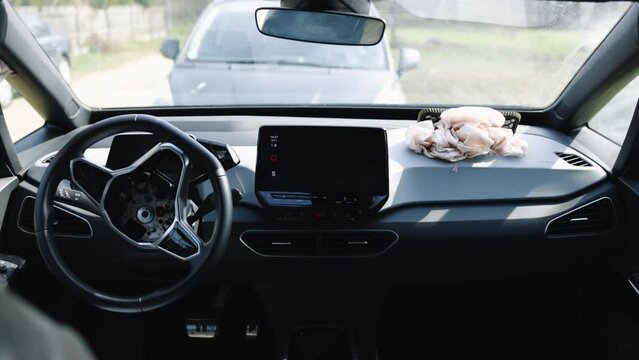 Car interior after an accident with airbags deployed. View from the inside of the cabin. Car after an accident. Safety device in the car. Air bag after car crash. Airbag in a car after an accident