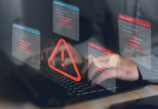 Computer hack warning,System hacked warning alert on notebook (Laptop),cyber security concept,The danger of malware viruses,ransomware virus,triangle caution warning sign notification error..