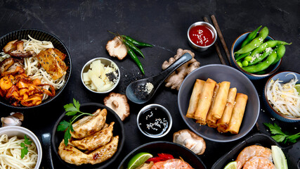Various of asian meals on rustic background , top view , place for text. Asian food concept.