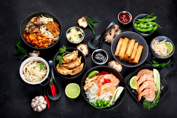Various of asian meals on rustic background , top view , place for text. Asian food concept.