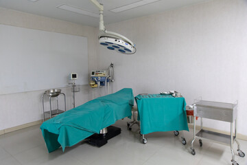 Recovery Room with beds and comfortable medical. Interior of an empty hospital room. Clean and empty room with a bed in the new medical center