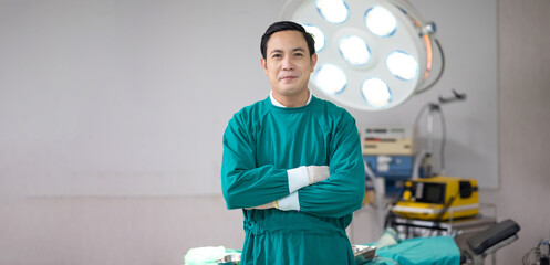 Portrait Medical surgery man in the operating room. Assistants and Nurses Performing Surgery.