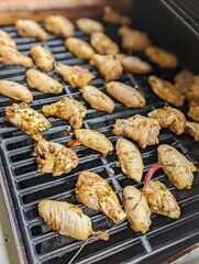 Closeup of delicious Chicken meat fried on a barbecue grill