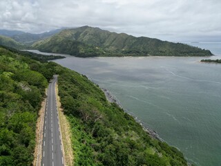 Beautiful shot of a highway and the ocean in Hienghene, New Caledonia