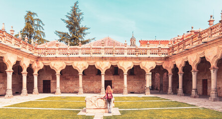 woman tourist enjoy patio of minor school in salamanca- Spain