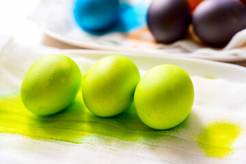 Painted eggs on the table after painting, a symbol of Easter, eggs