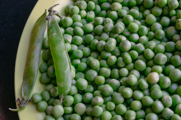 Organic peas closeup background texture. Vegetable, cool, flavor, kitchen, healthy, Ayurveda, treatment, soak, green