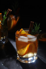 Orange rosemary bourbon cocktail in low key