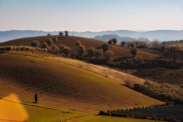 Countryside landscape in autumn, agricultural fields among hills