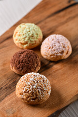 Fresh french cookies dessert on the wooden plate