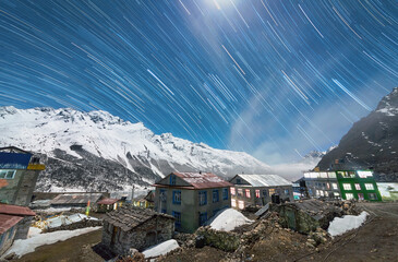 Stars trails over the village in the Langtang Valley, Nepal Himalays