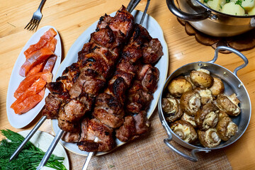 russian feast, kebab and boiled potatoes traditional Russian food