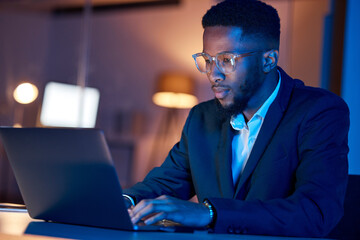 Black man, laptop and typing, businessman focus with coding or writing report, information technology and data analysis. Email, networking and research, programmer and software upgrade at night