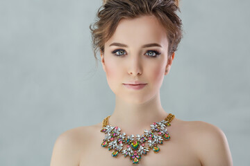 Necklace, jewelry around the neck of a beautiful woman. luxury model