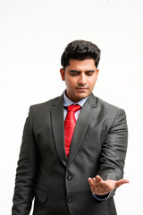 Young Businessman presenting and watching palm with empty space