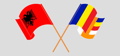 Crossed and waving flags of Albania and Buddhism