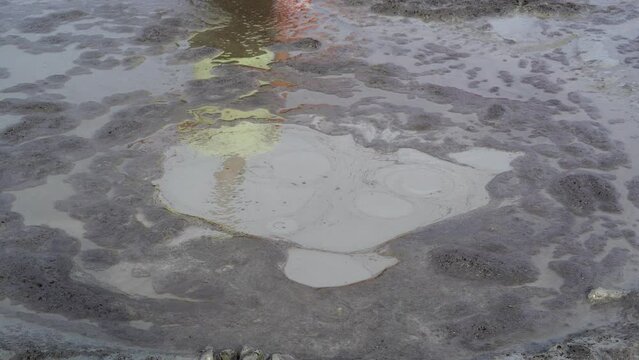 Volcano Mud Puddle Slowly Releasing Gas Bubbles at Natural Mud Volcanoes in Romania