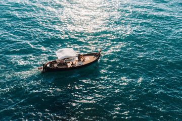 small boat used for sightseeing and admiring the beauty of the 5 Terre villages, located on the...