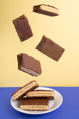 photo of pieces of cake falling on the plate
