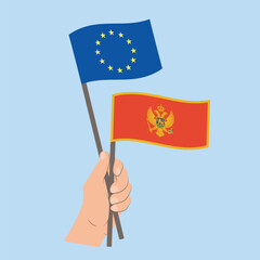 Flags of EU and Montenegro, Hand Holding flags