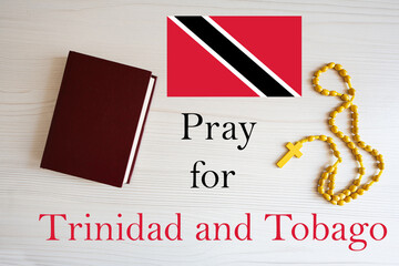 Pray for Trinidad and Tobago. Rosary and Holy Bible background.