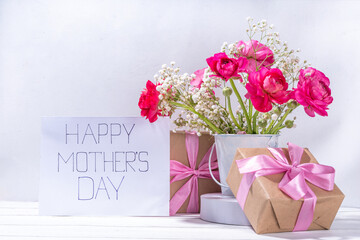 Mothers day gift and flowers background