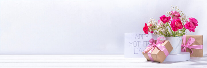 Mothers day gift and flowers background