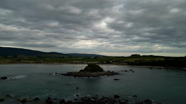 Monkey Island, Southland orepuki new Zealand stunning natural seascape cloudy sky aerial footage