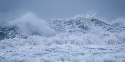 Fototapeta na wymiar crashing waves off chapel Porth beach Cornwall UK 