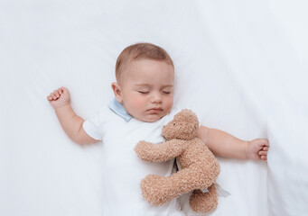 Cute little baby boy sleeping - 588757179