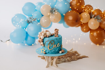 Photo zone for the first cake in blue and coffee colors. The blue cake is delicious and aesthetically beautiful