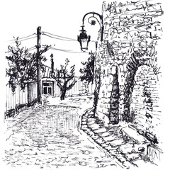 Street in small europeand old town with wall and lantern on it. Hand drawn sketch with ballpoint pen on paper texture. Isolated on white. Bitmap