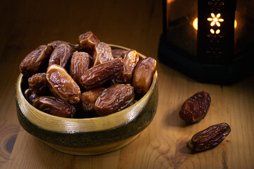 Close up shot of date fruits in an ambient place for break fasting at iftar time