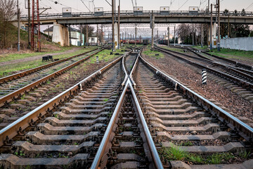 Fototapeta na wymiar Industrial logistic and transportation concept background, forward railway track switch for train. Railway and industrial area of city