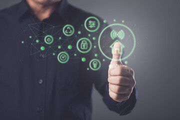 Smart Home and new technology to management the house, House intelligent control system concept, Hand shows the signs of smart home icon on dark background, Idea of new smart solution.