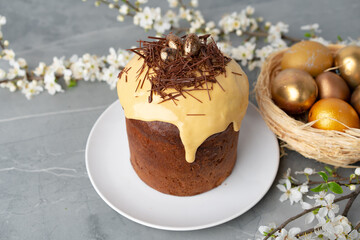 Easter cake with nest decor on gray background