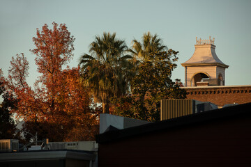 Redding, California, USA - November 22, 2021: Late afternoon sun shines on historic downtown...