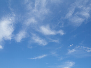 An image of a beautiful sky with clear clouds
