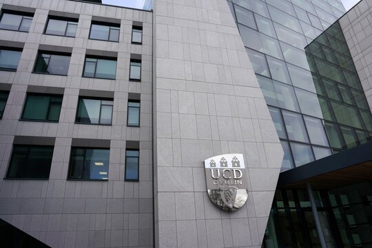 Crest on the exterior wall of a building o University College, Dublin