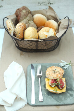 image of table set with attractive natural sandwich and breads