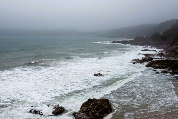 deserted Cornish beach on a misty Spring day