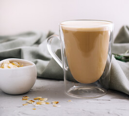 Almond milk latte in a glass