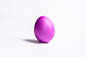 Pink Easter egg isolated on a white background