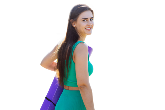 Attractive fit hispanic young woman in sportswear carrying yoga mat against transparent background, looks back at camera toothy smiles. Cheerful sporty caucasian girl going tomato morning workout.